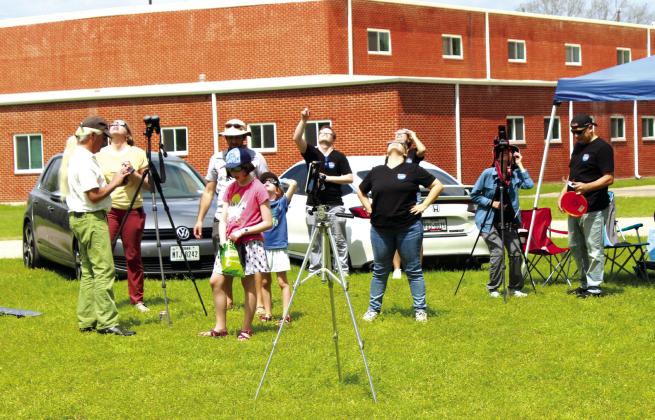 The Lanza Family chased the total solar eclipse outside the Armory in Clifton City Park from California, Nevada by way of Granbury, Texas, where one of their members is currently based on Monday, April 8, 2024 Nathan Diebenow | The Clifton Record